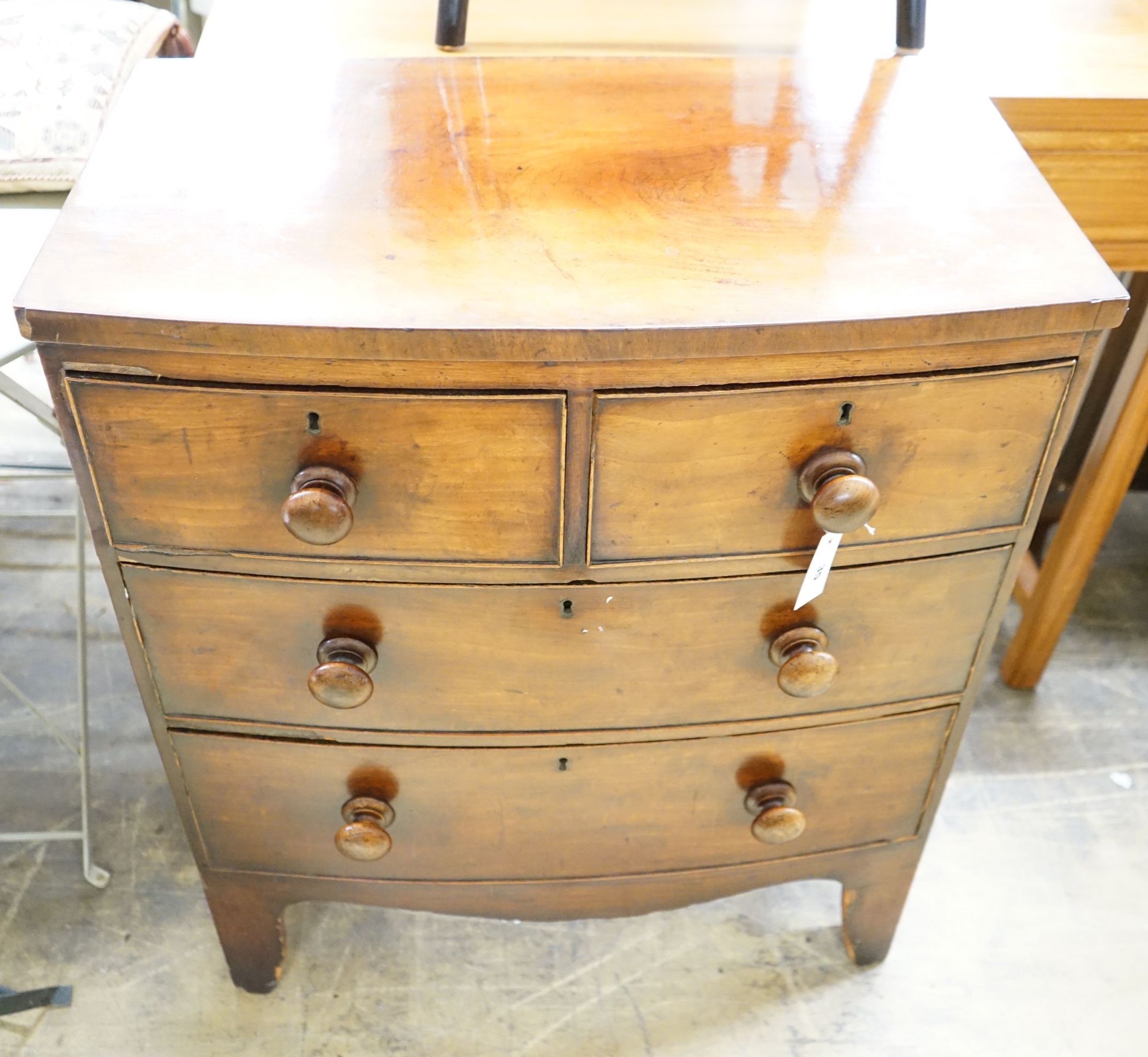 A small Victorian mahogany bow front chest, width 72cm, depth 42cm, height 87cm